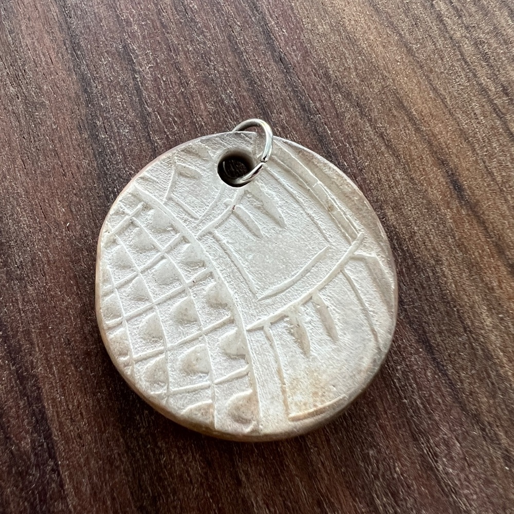 Round Carved Stone Pendant